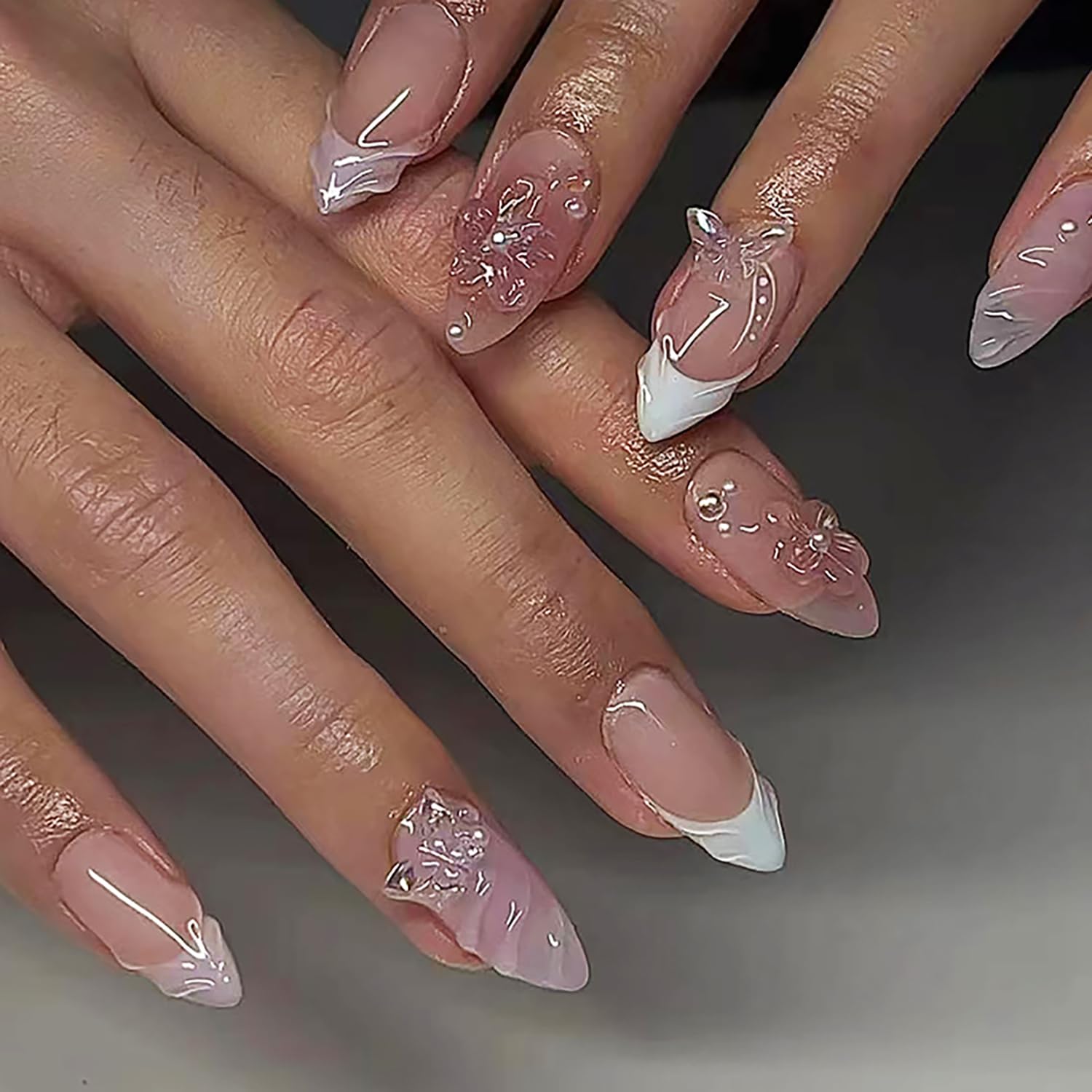 Photo 1 of 24 Pcs Pink Almond Press on Nails Medium Fake Nails with Glue Reusable False Nails with 3D Flower Butterfly Design Stiletto Nails Acrylic Nail Press ons Spring Nails for Women Nail Art Decorations