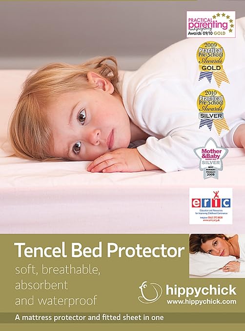 cot bed mattress protector 140 x 70