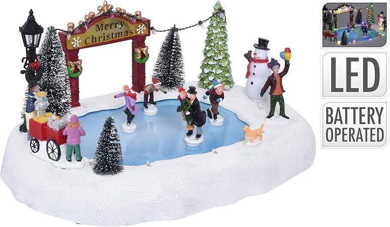 Immagini Natalizie In Movimento.Peragashop Scena Di Natale Con Pista Di Pattinaggio Con Movimento E Led Da 16 Cm Decorazioni Natalizie Amazon It Casa E Cucina