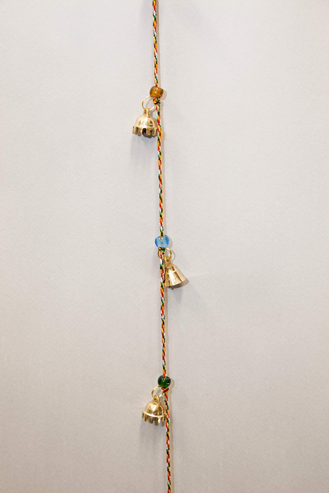 Beautiful Chime with Ten Polished Brass Bells about 1" High on a 40" String