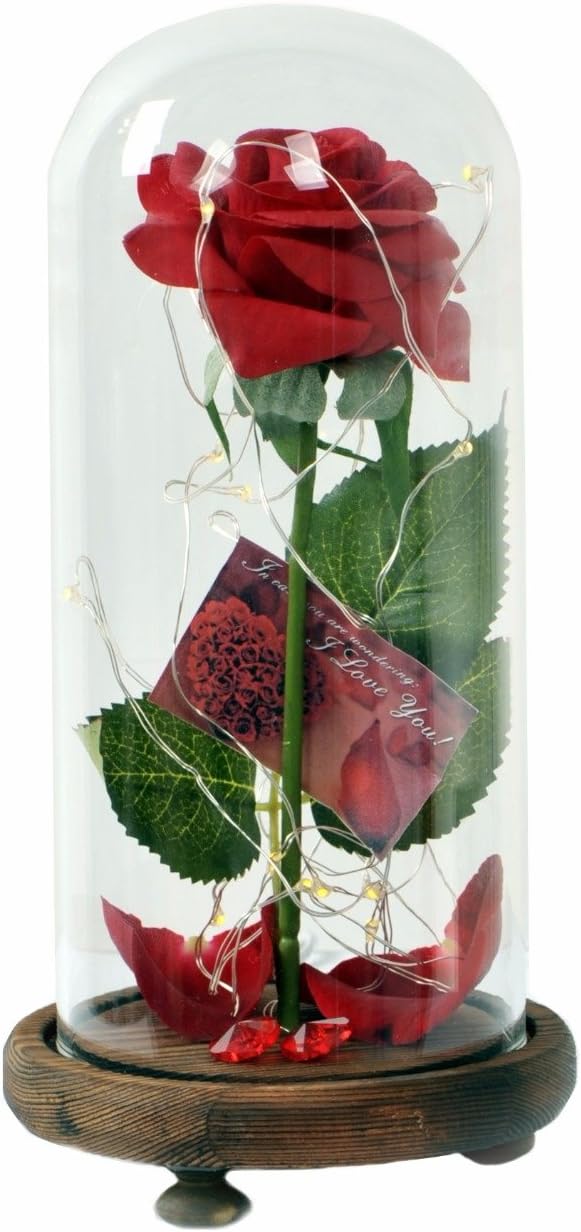 beauty magic rose ، it's an artificial red rose with LED light & Fallen Petals In a glass dome & wooden base with love card & a small heart shape glass