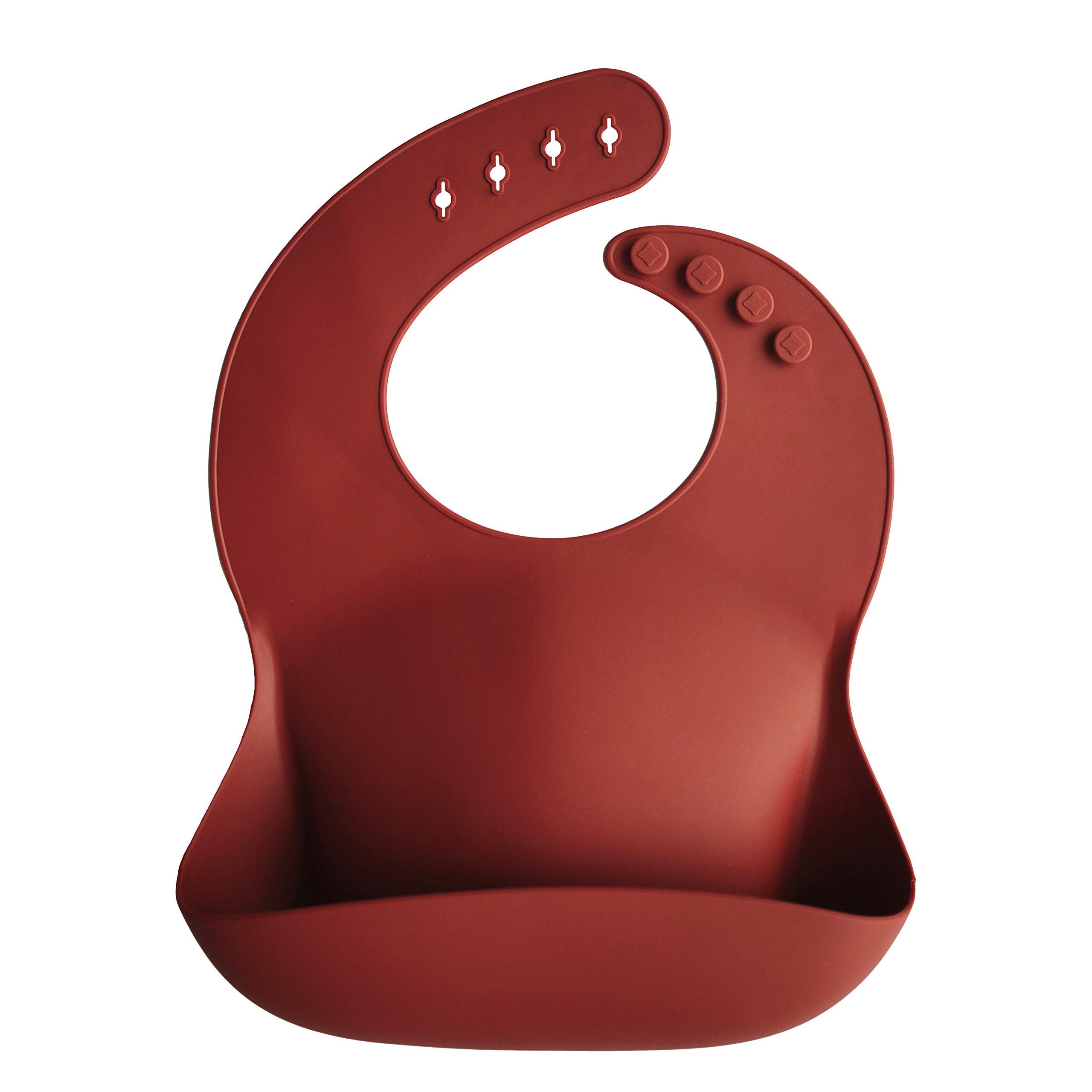 mushie Baby Silicone Bib | Adjustable Fit Waterproof Bibs | Easy Wipe Baby Feeding Bibs | 4 Adjustable Sizes with Deep Front Pockets | 100% BPA and Phthalate Free (Raw Sienna) — image 1
