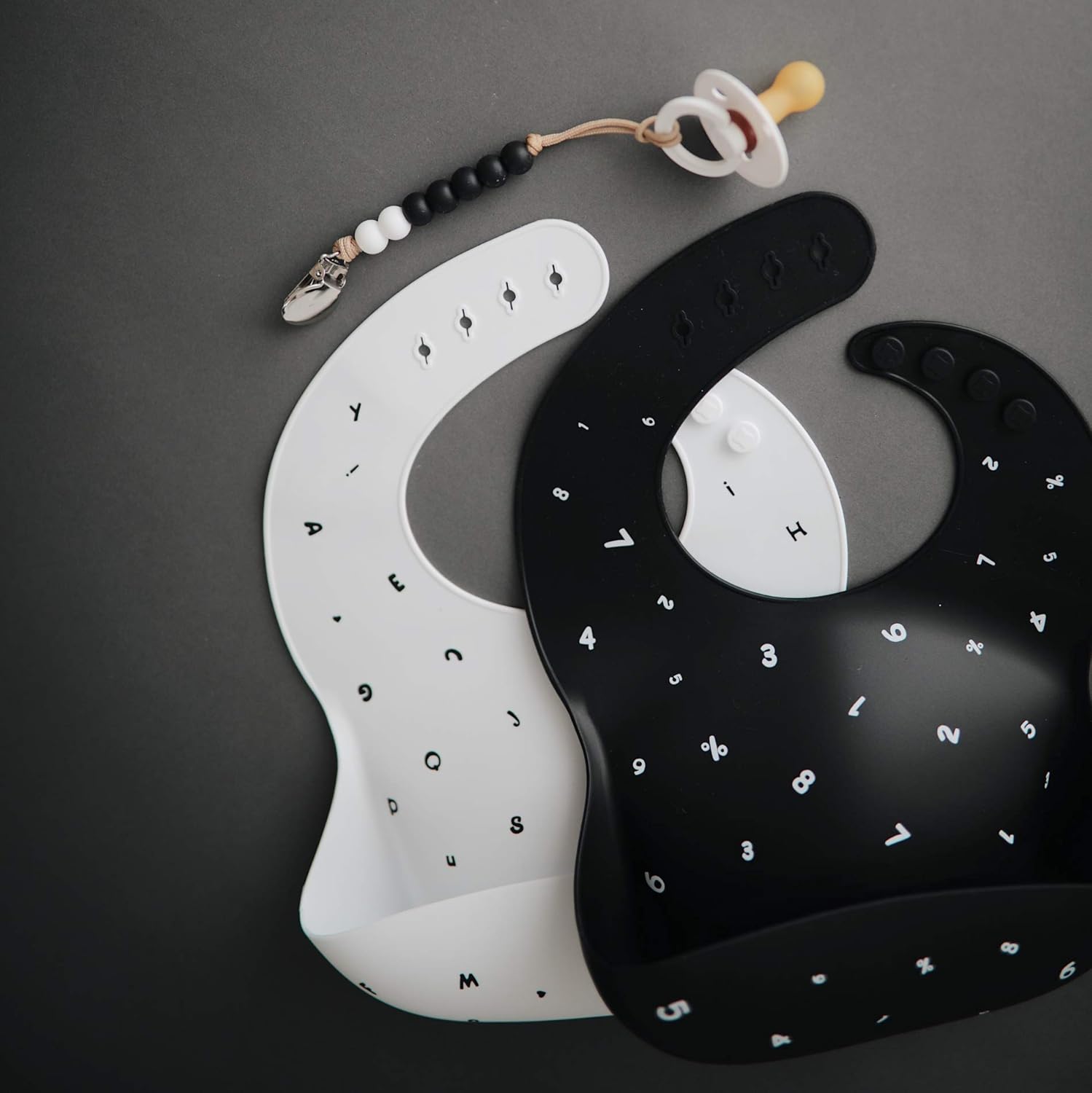 mushie Silicone Baby Bib | Adjustable Fit Waterproof Bibs (Rocket Ship): Baby