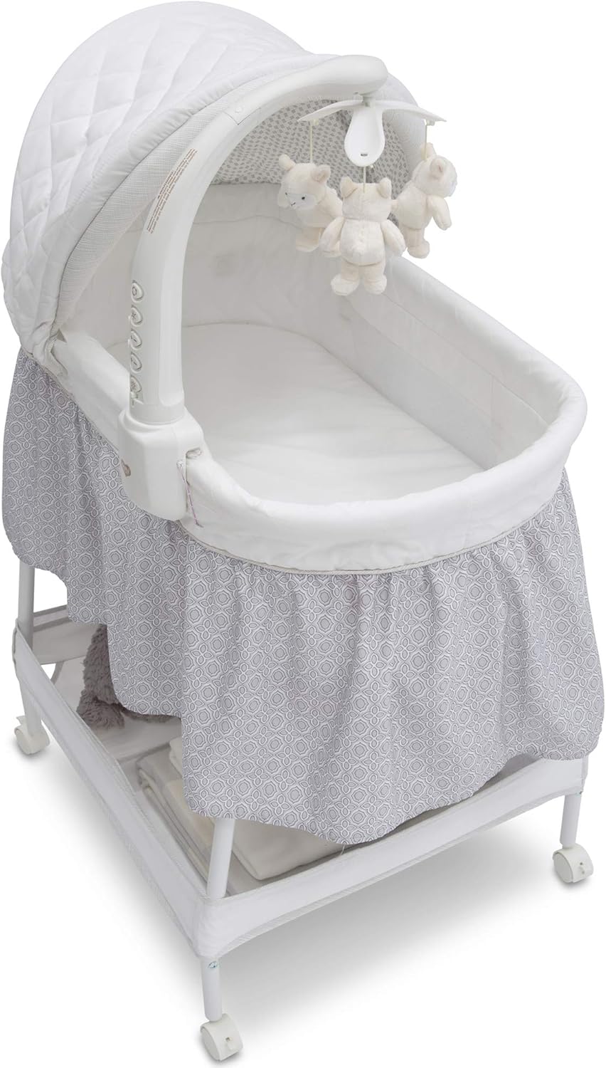 delta children by the bed deluxe bassinet