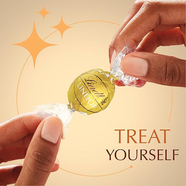 LINDT LINDOR WHITE CHOCOLATE CANDY TRUFFLES, WHITE CHOCOLATE CANDY WITH SMOOTH, MELTING TRUFFLE CENTER, 25.4 OZ., 60 COUNT
