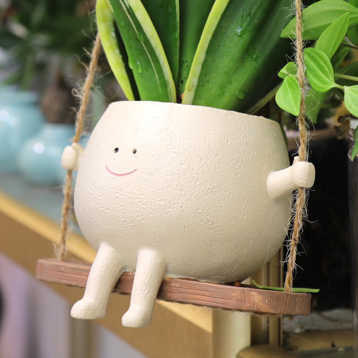 Photo 1 of HUNTHAWK Swing Face Planter Pot Hanging Resin Flower Head Planters for Indoor and Outdoor Plants, Succulent Pots for String of Pearls Plant - Ideal Gifts for Mother's Day and Christmas (Medium)