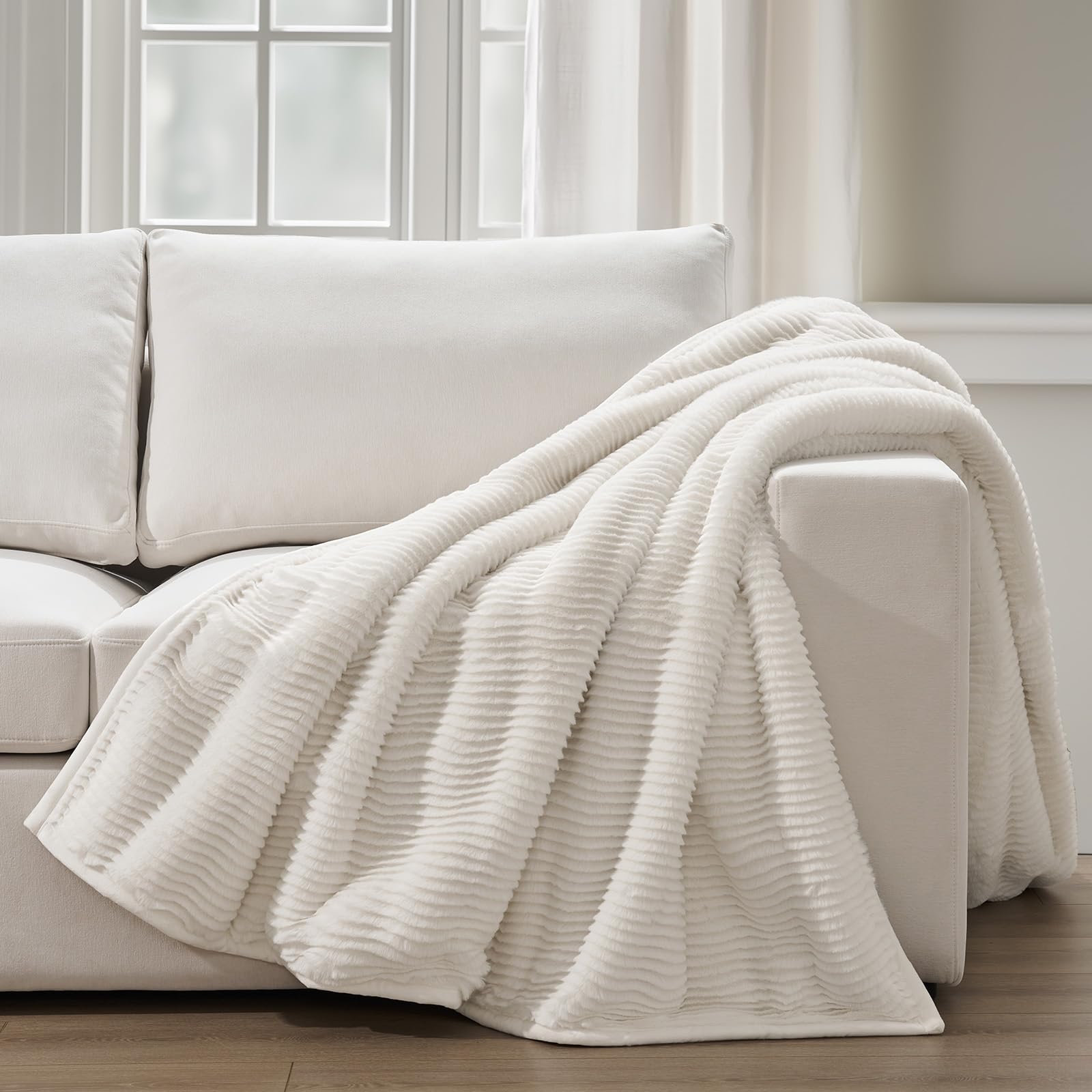 Photo 1 of EVERGRACEHOME Ultra Soft Faux Fur Throw Blanket for Couch, Luxury Sculpted Texture Faux Rabbit Fur Blanket for Bed, Fluffy Thick Plush Warm Fuzzy Throw, 920GSM (Bright White, 60''x80'')