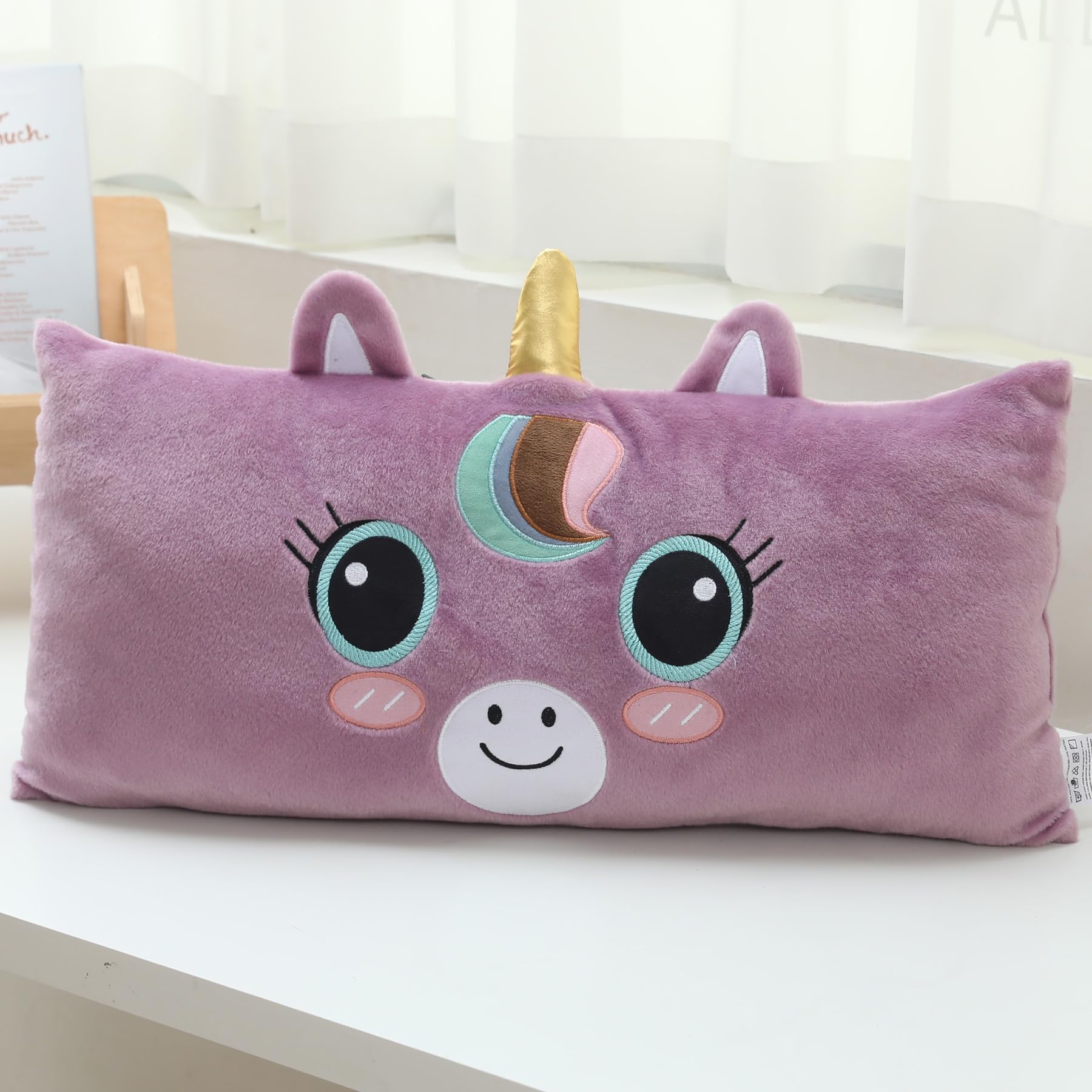 Photo 1 of Snugtown Stuffed Animal Lumbar Pillow, Super Soft Plush Cuddle Throw Pillow for Kids, Cute Unicorn Shaped Pillow, 12 x 24 Inches, Purple