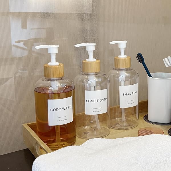 SHAMPOO AND CONDITIONER DISPENSER, REFILLABLE PLASTIC SHAMPOO PUMP BOTTLES WITH WATERPROOF LABELS, EMPTY BODY WASH DISPENSER SET FOR BATHROOM, SHOWER SOAP BOTTLES (CLEAR, SET OF 3, 16.9OZ)