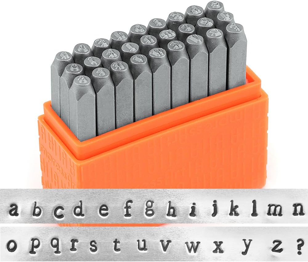 Set tampons Alphabet minuscule pour gravure sur métal Newsprint 27