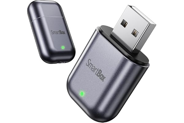 Wireless CarPlay adapter plugged into a car's USB port, showing the compact dongle design typical of this product category