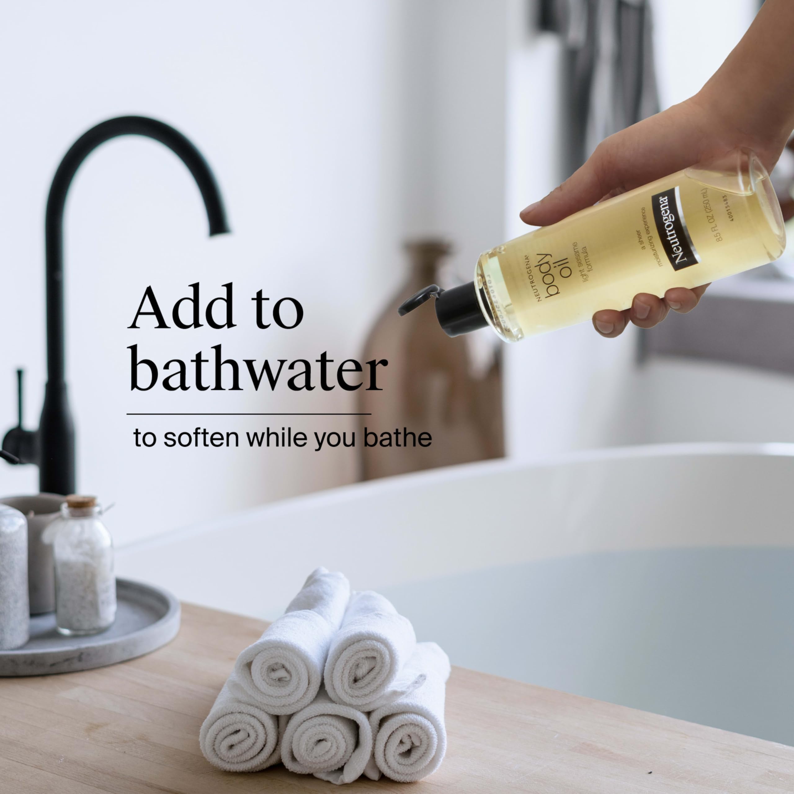 Neutrogena Body Oil Light Sesame Formula, 16 fl oz, Radiant Glow Moisturizer for Dry Skin, Bath & Shower Oil For Smooth and Hydrated Skin