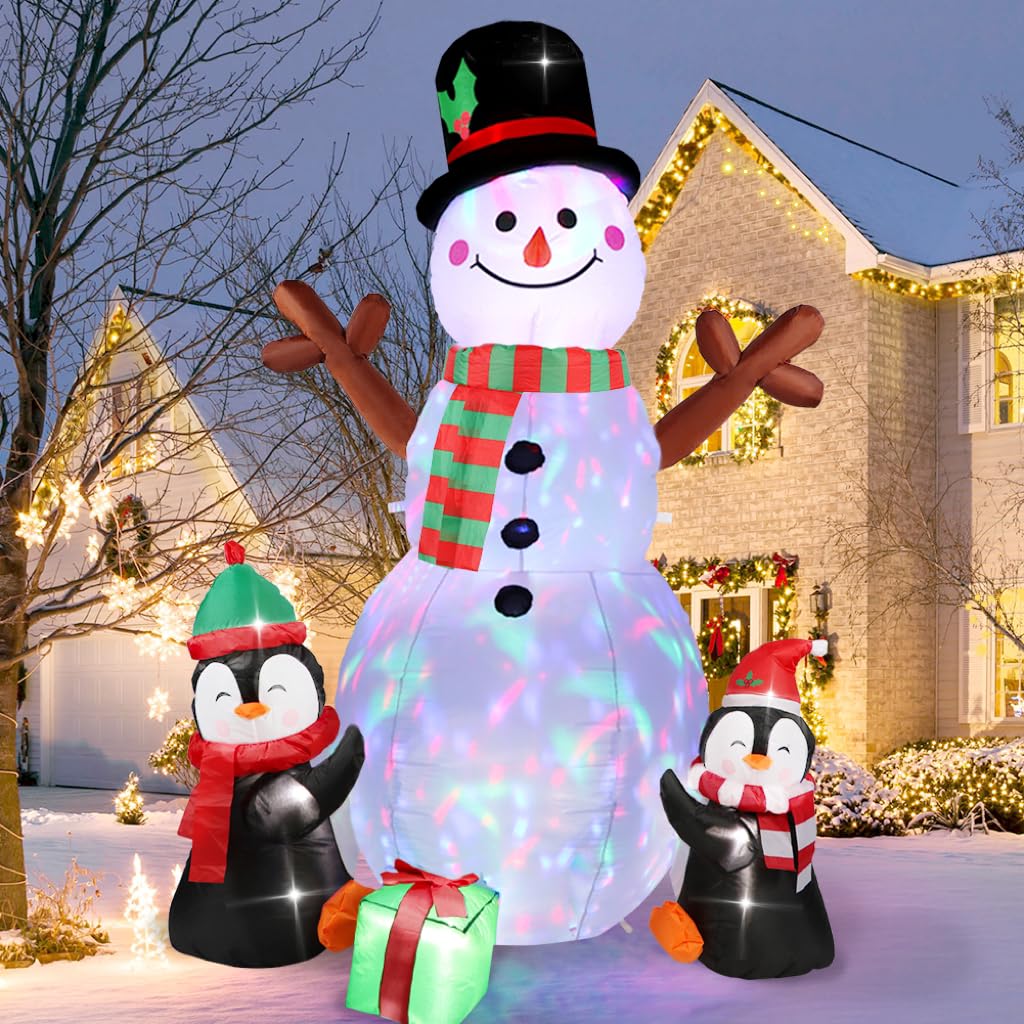 Photo 1 of OurWarm 6ft Christmas Inflatables Christmas Decorations Outdoor, Inflatable Snowman Penguin Blow Up Yard Decorations with Rotating LED Lights for Indoor Outdoor Christmas Decorations Yard Garden Decor