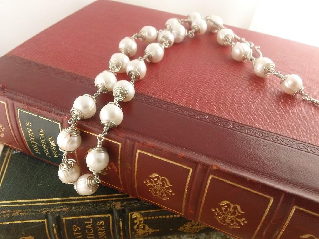 Wire-wrapped Plump White "Potato" pearls are joined in hand-wrapped spirals of sterling silver wire