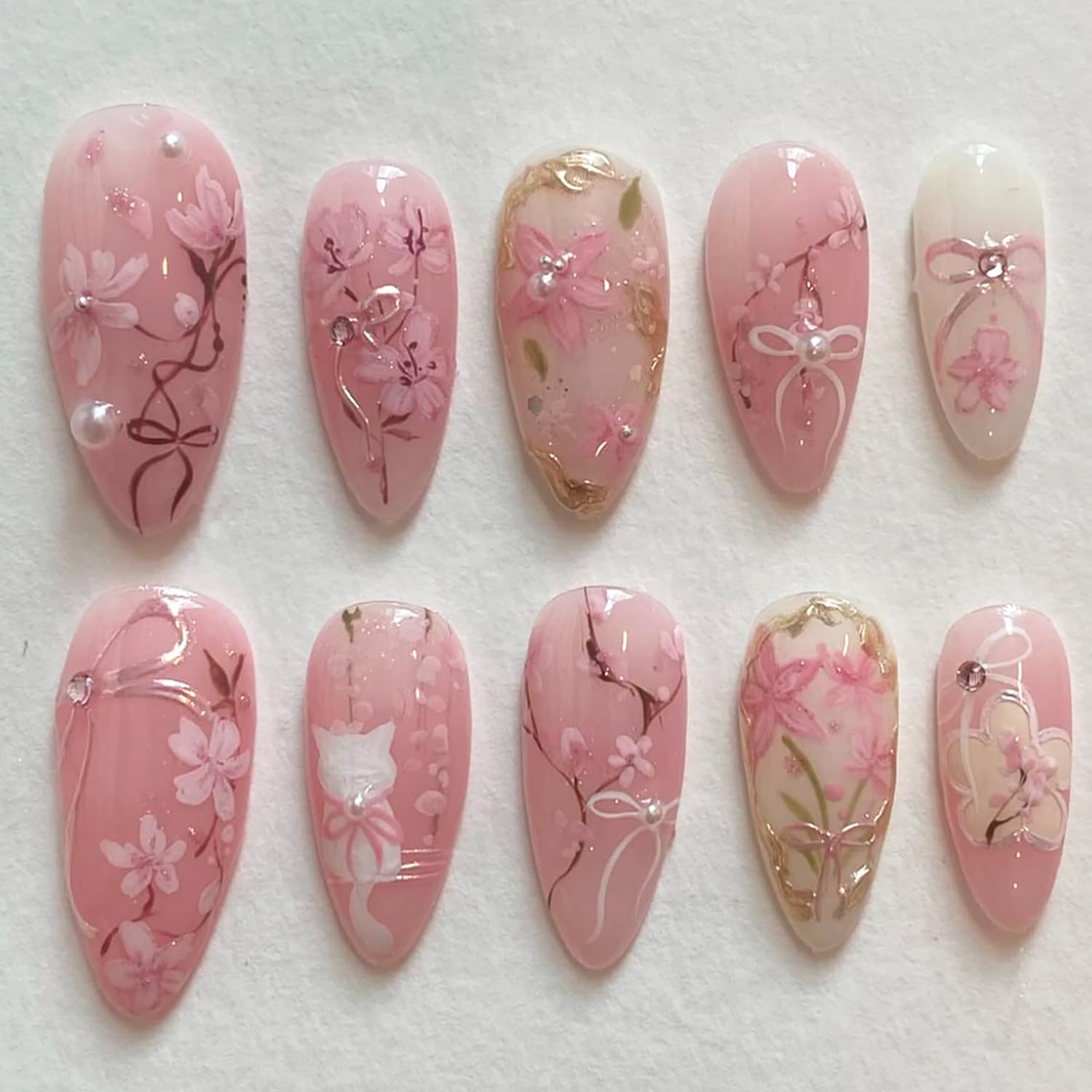 Photo 1 of 30Pcs Pink Flower Press on Nails Medium Almond Fake Nails with 3D Pearl Rhinestones Designs Glue on Nails Peach Blossom Acrylic Nails Cute Cat False Nails Bow Stick on Nails for Women Nail Supplies