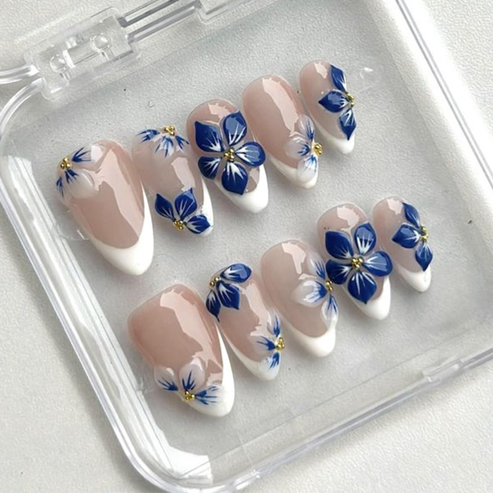 Photo 1 of 24Pcs White French Tip Press on Nails Medium Almond 3D Flower Fake Nails with Gold Pearl Designs Glossy Artificial Acrylic Full Cover False Nails Blue Floral Nails Summer Press ons for Women Manicure