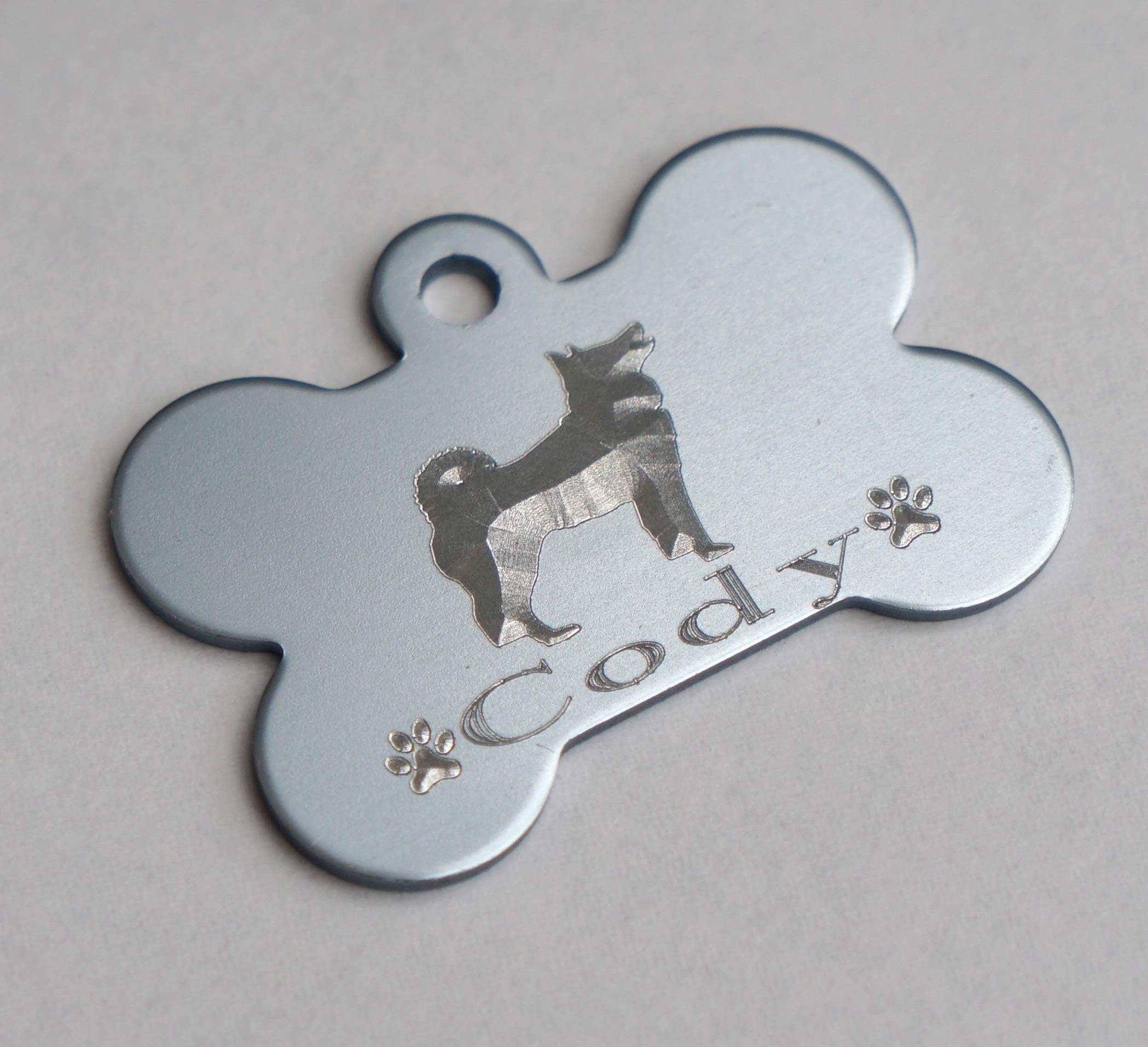 Paradise Pets AKITA DOG TAG WITH 3D IMAGE OF BREED PERSONALISED WITH NAME ON FRONT AND ENGRAVED WITH YOUR CHOICE OF TEXT ON REVERSE 38MM BONE TAG