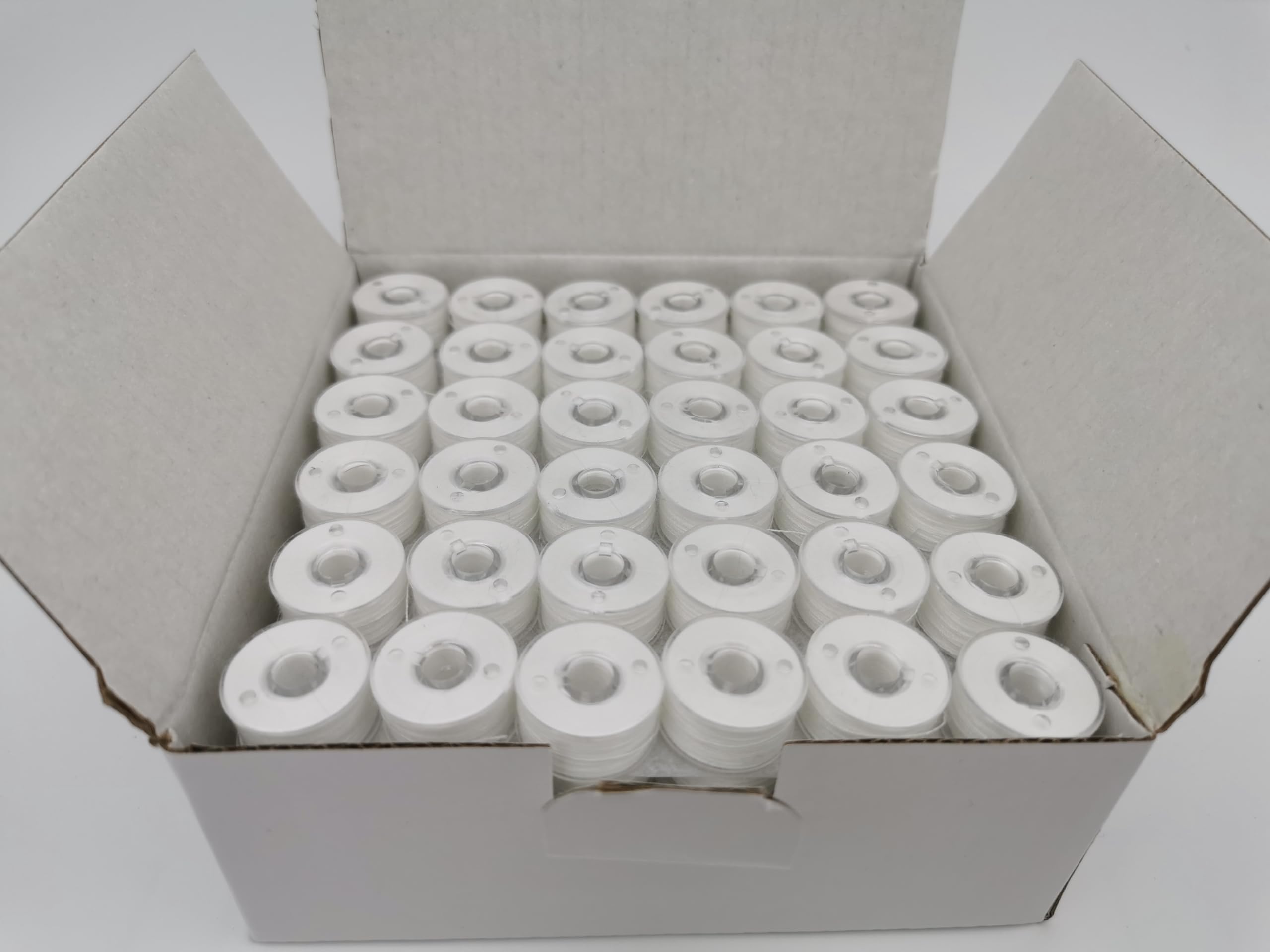 DOUBLELIN Perwound Bobbin, Size A, Class 15, SA156, Size 11.5, Plastic Sided Type (40S/2, White) — image 1