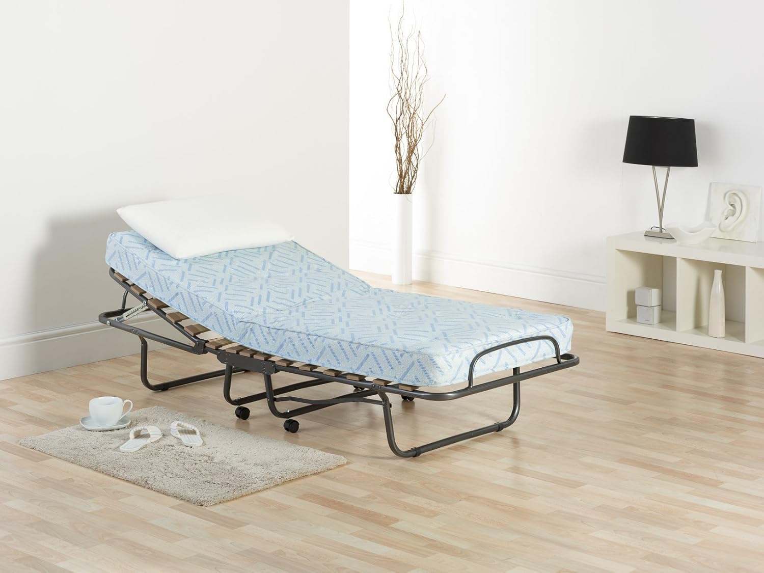 Folding Bed. Adjustable Folding Bed with Sprung Interior Mattress