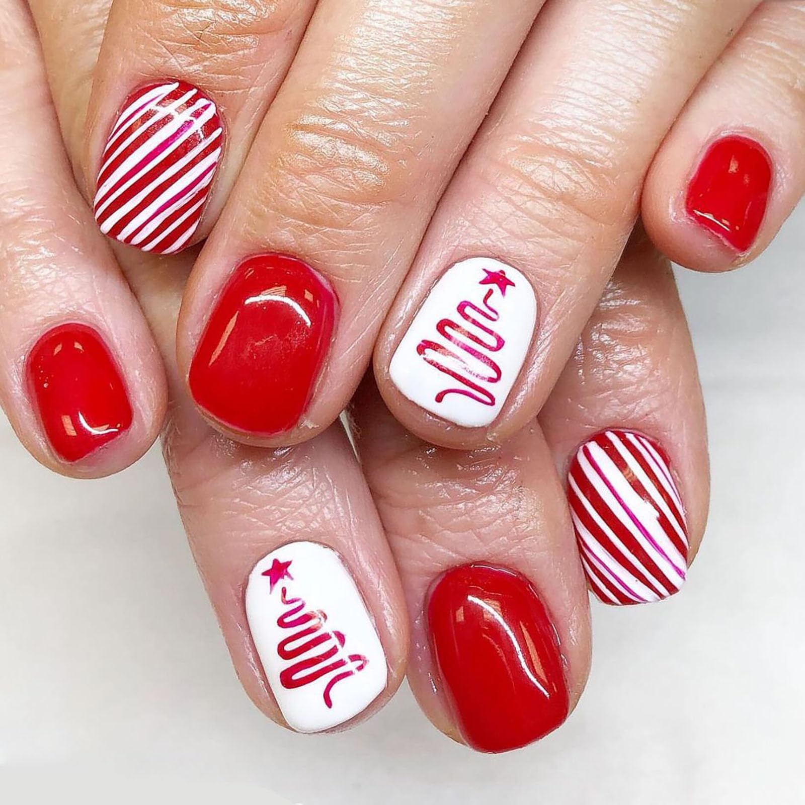 Photo 1 of (2) Christmas Fake Nails Short Square Winter Press on Nails Red Full Cover Xmas Tree Candy Cane False Nails with Designs Glossy Glue on Nails Acrylic Nails Artificial Nails for Women Girls 24Pcs