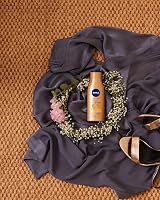 NIVEA Q10 Firming + Radiance Gradual Tan 400 ml Pack of 2 view 5