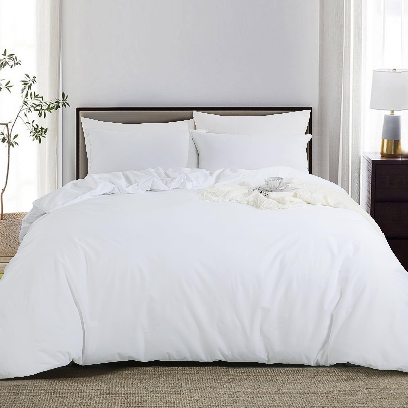 Photo 1 of HOMBYS Breathable Waterproof Duvet Cover, Reversible White King Size Waterproof Duvet Protector, Moisture Wicking Treatment Comforter Protector with Corner Ties for Pets, Dog, Cat, Kids, Elder