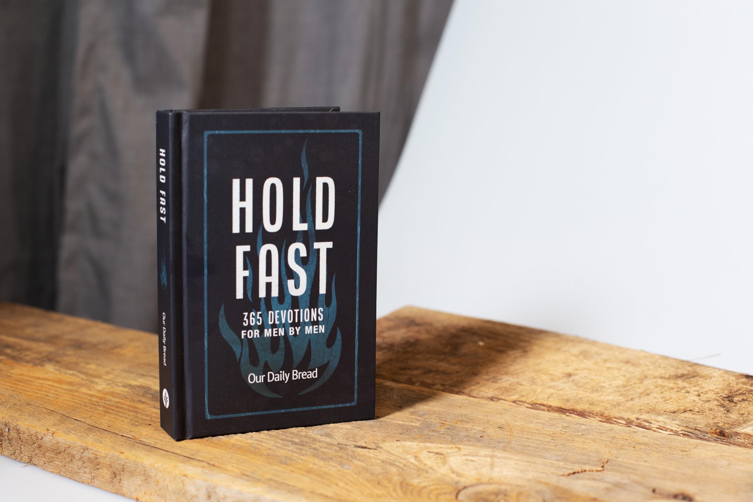 Hold Fast: 365 Devotions for Men by Men (A Daily Bible Devotional for the Entire Year) (Stand Strong)