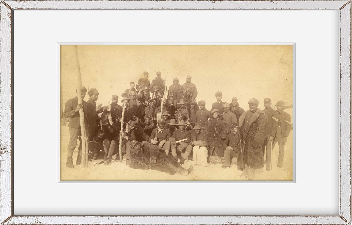 Photographs - 1890 Photo Buffalo soldiers of the 25th Infantry, some wearing buffalo robes, Ft. Keogh, Montana] / Chr. Barthelmess, photographer, Fort Keogh, Montana. Location: Fort Keogh, Montana