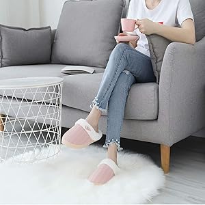 women wearing fuzzy slippers