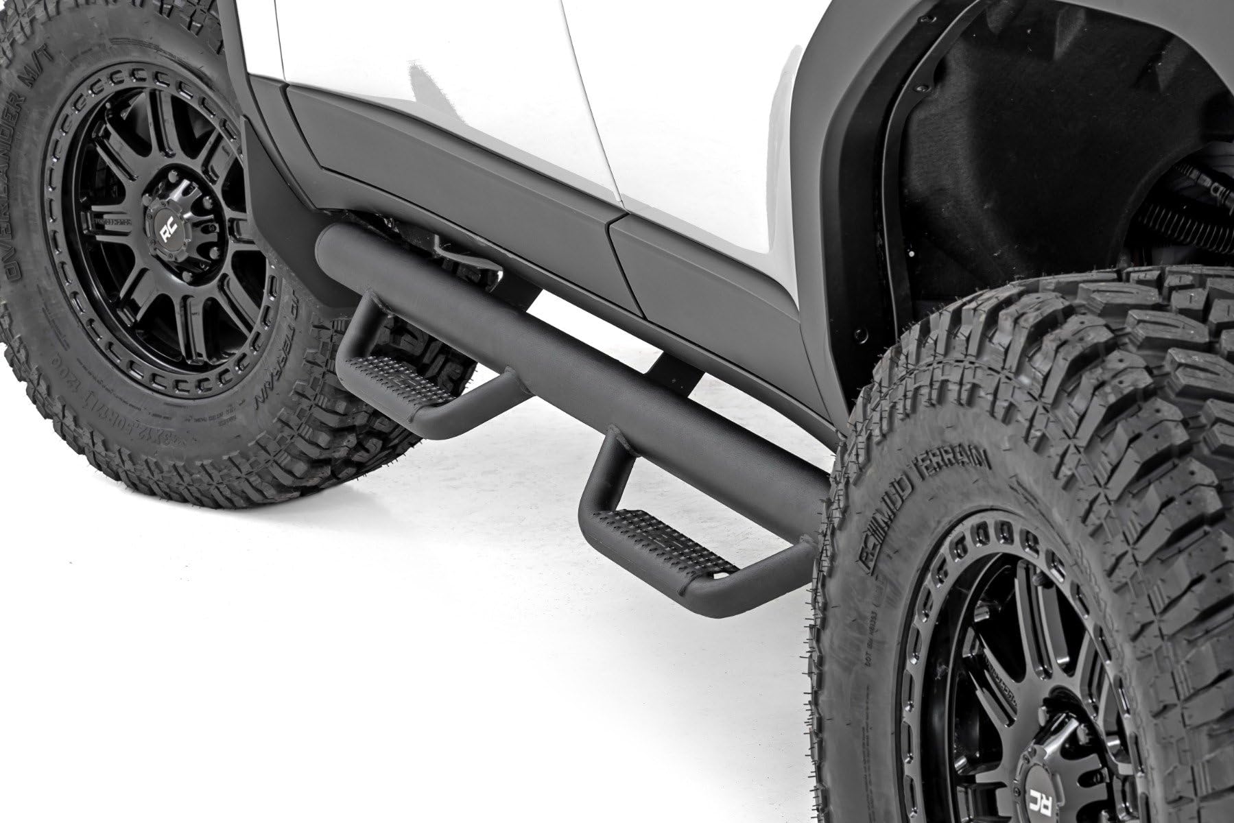 Photo 1 of ?Rough Country Nerf Step Bars for Toyota Land Cruiser (2024-2025) - Rugged Cab Length Nerf Bar with Side Steps, Bolt-On Install