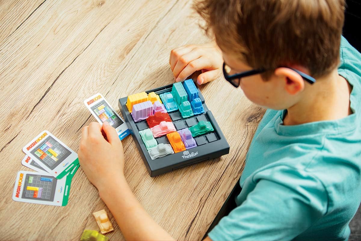 ThinkFun Rush Hour Traffic Jam Brain Game and STEM Toy for Boys and Girls Age 8 and Up – Tons of Fun With Over 20 Awards Won, International Bestseller for Over 20 Years: Toys & Games