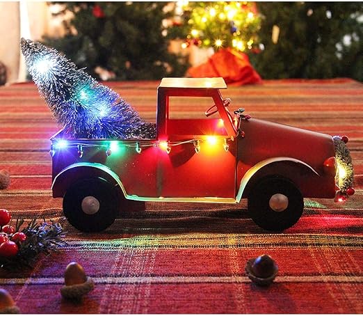 red toy truck with christmas tree