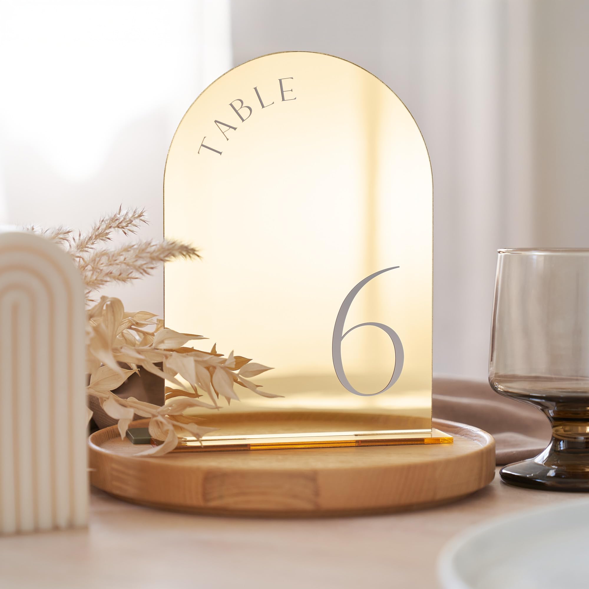 Photo 1 of ZICOTO Beautiful Gold Wedding Table Numbers with Stands - Elegant Double Sided 5x7 inch Acrylic Signs Numbered 1-15 - The Perfect Decor for Your Wedding Reception Or Events