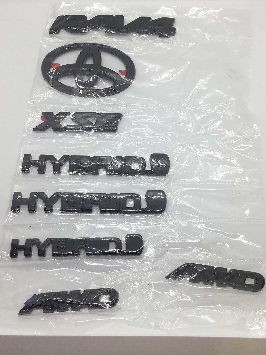 toyota hybrid awd on Amazon Com Genuine Toyota Rav4 Hybrid Xse Gloss Black Blackout Emblem Overlay Kit Pt948 4219b 02 Automotive