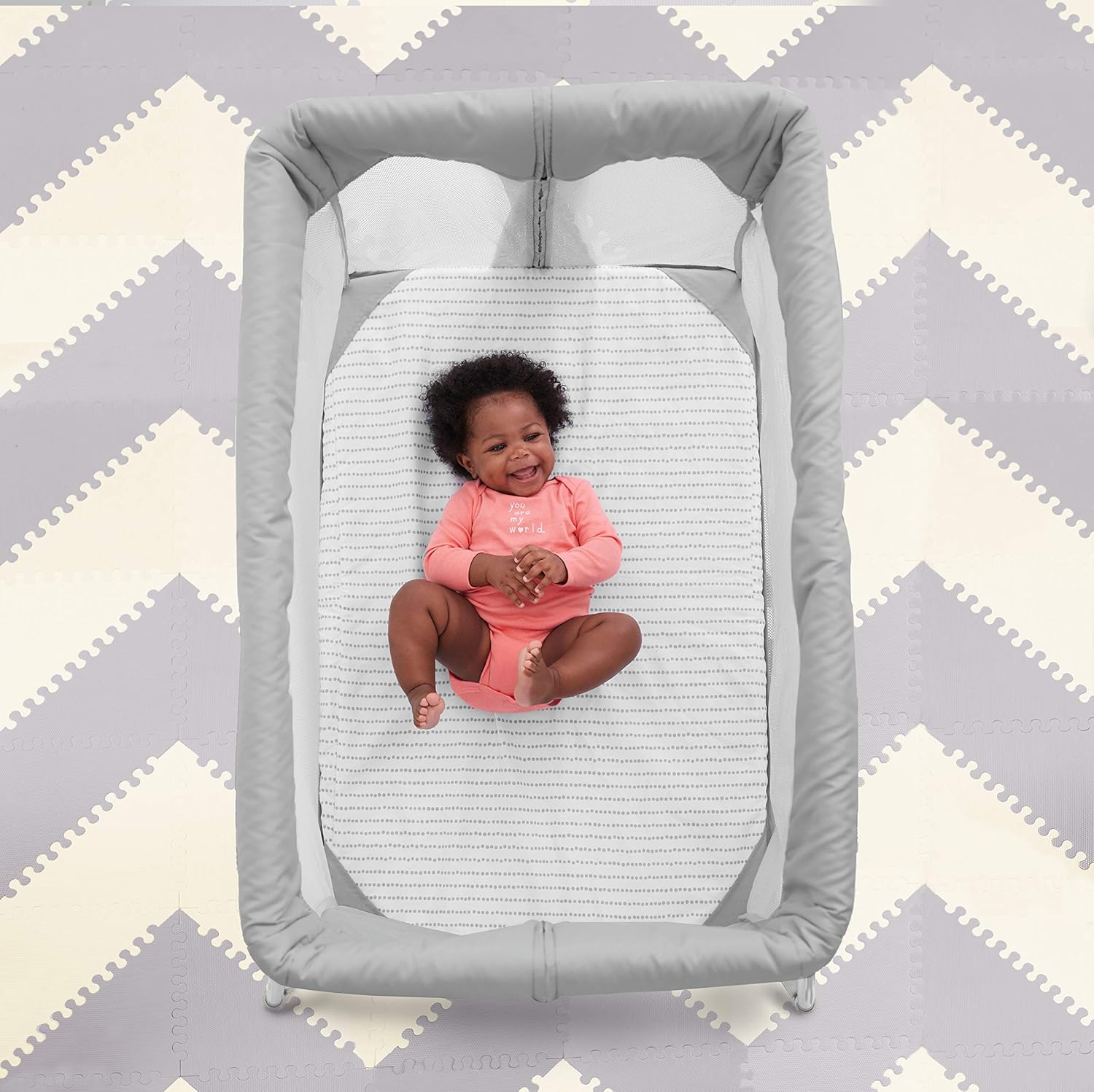 play to night expanding travel crib