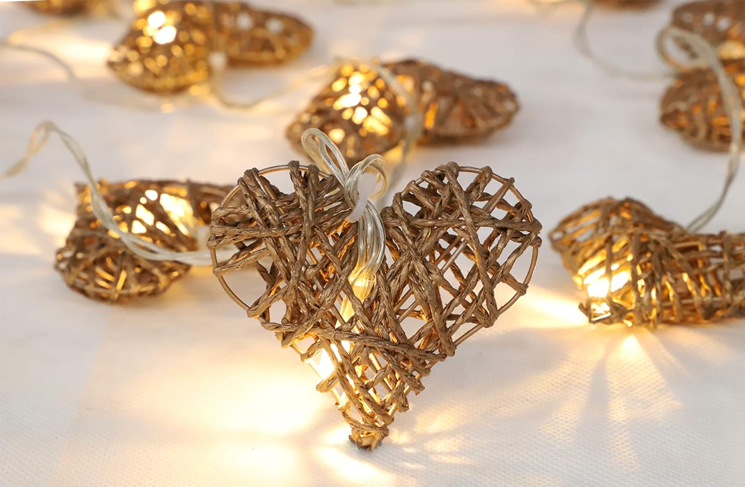 Christmas Concepts® 10 Gold Rattan Heart Lights with Warm White LED Lights - 1.5m (5ft) Length - Battery Operated - Image 4