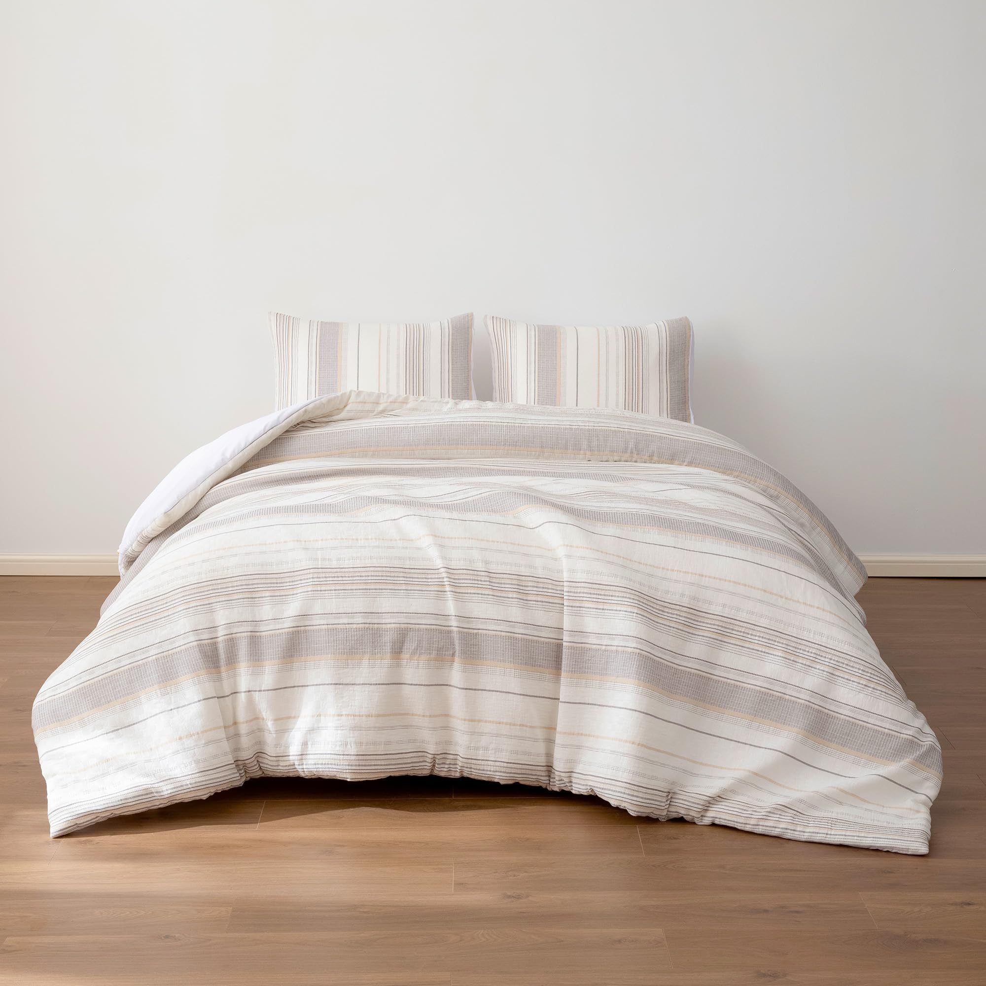 Photo 1 of Amazon Basics 3-Piece Jacquard Microfiber Comforter and Pillow Sham Set, All-Season Bedding Set, Beige Striped, Queen