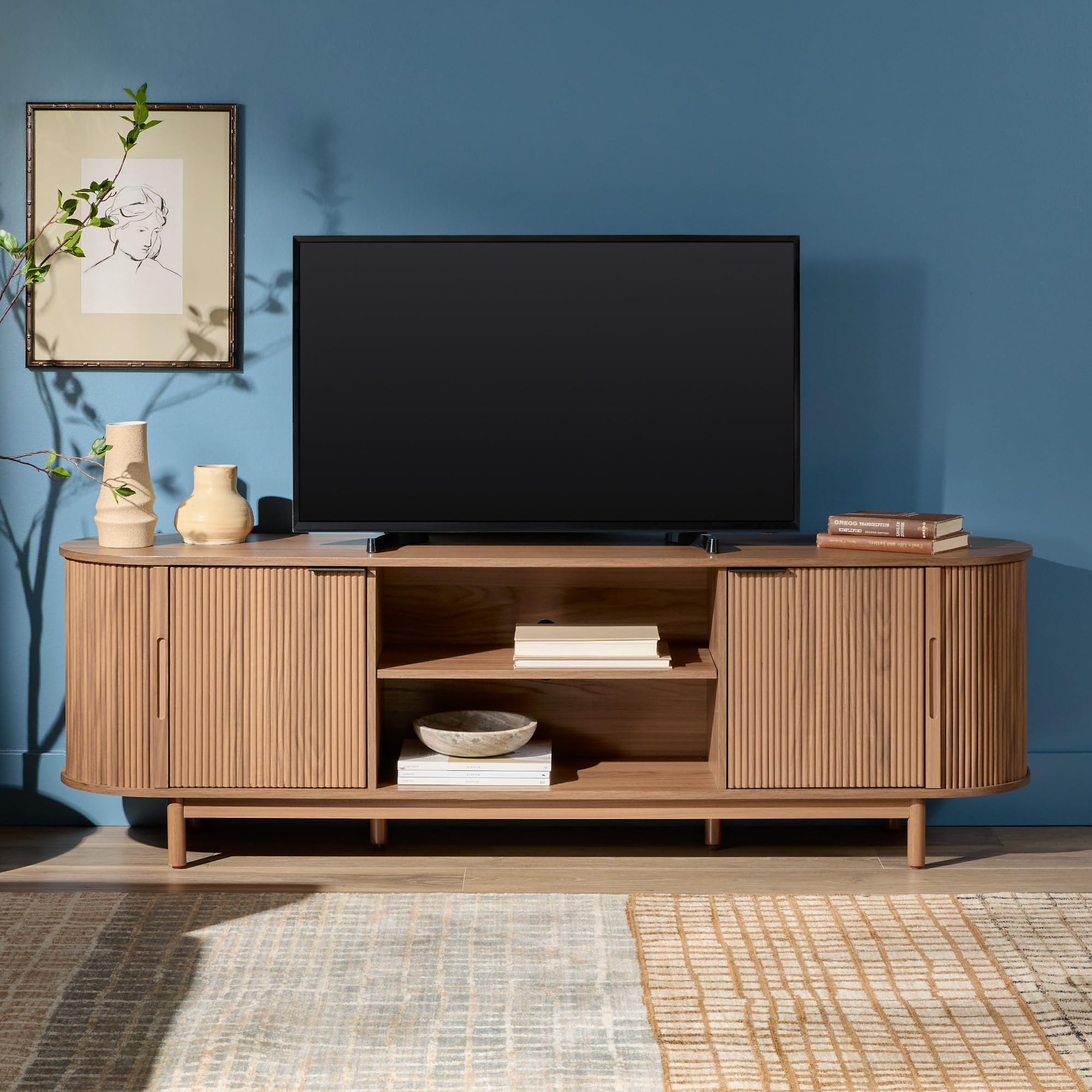 Photo 1 of Walker Edison Modern Curved Reeded TV Stand for TVs up to 70 Inches, Credenza with Sliding Doors and Adjustable Shelves, TV Stand with Cord Management Cutout, 70 Inch, Mocha