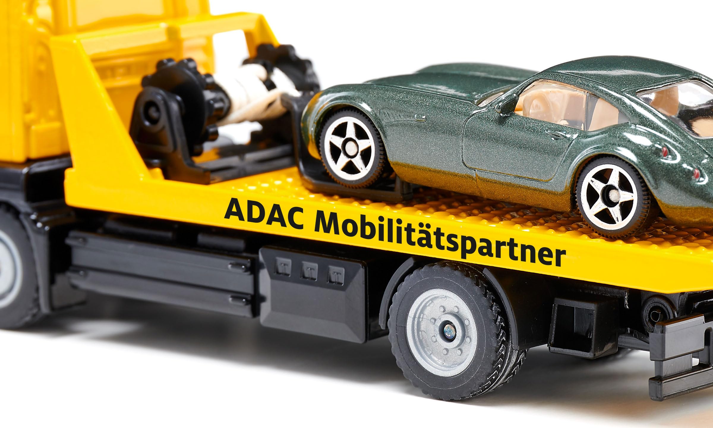 Siku 2722, MAN Abschleppwagen ADAC, Inkl. Abzuschleppendem Spielzeugauto, 1:55, Metall/Kunststoff, Gelb, Originalgetreue Funktionen, Ausziehbare Seilwinde, Kipp- und absenkbare Transportplattform 5