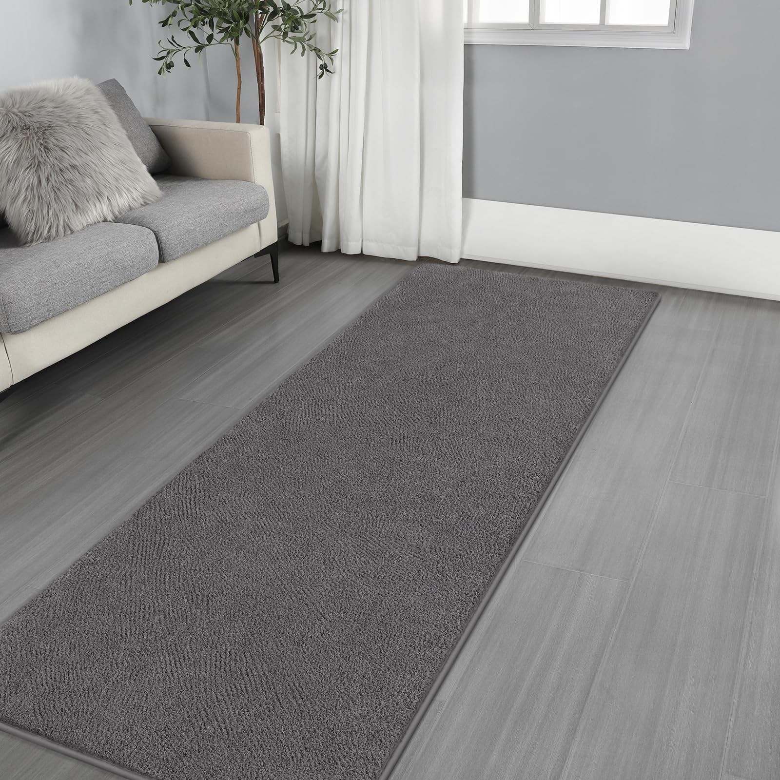 Photo 1 of Gifeas Ultra Soft Modern Runner Rugs for Living Room Bedroom, 2x6 Feet Dark Grey Thickened Memory Foam Indoor Solid Minimalist Carpets, Non-Slip Comfy Area Rug for Boys Girls Nursery Room Home Decor