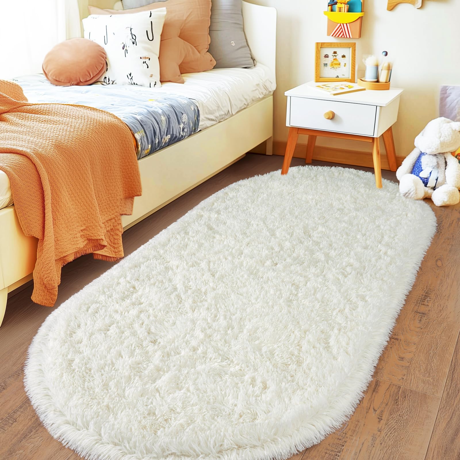 Photo 1 of Pionblank Fluffy Oval Rug for Bedroom 2.6x5.3, Shag Throw Rugs for Bedside, Ultra Soft Cute Plush Carpet for Girls Boys Room Living Room Nursery Dorm Home Decor, Cream White