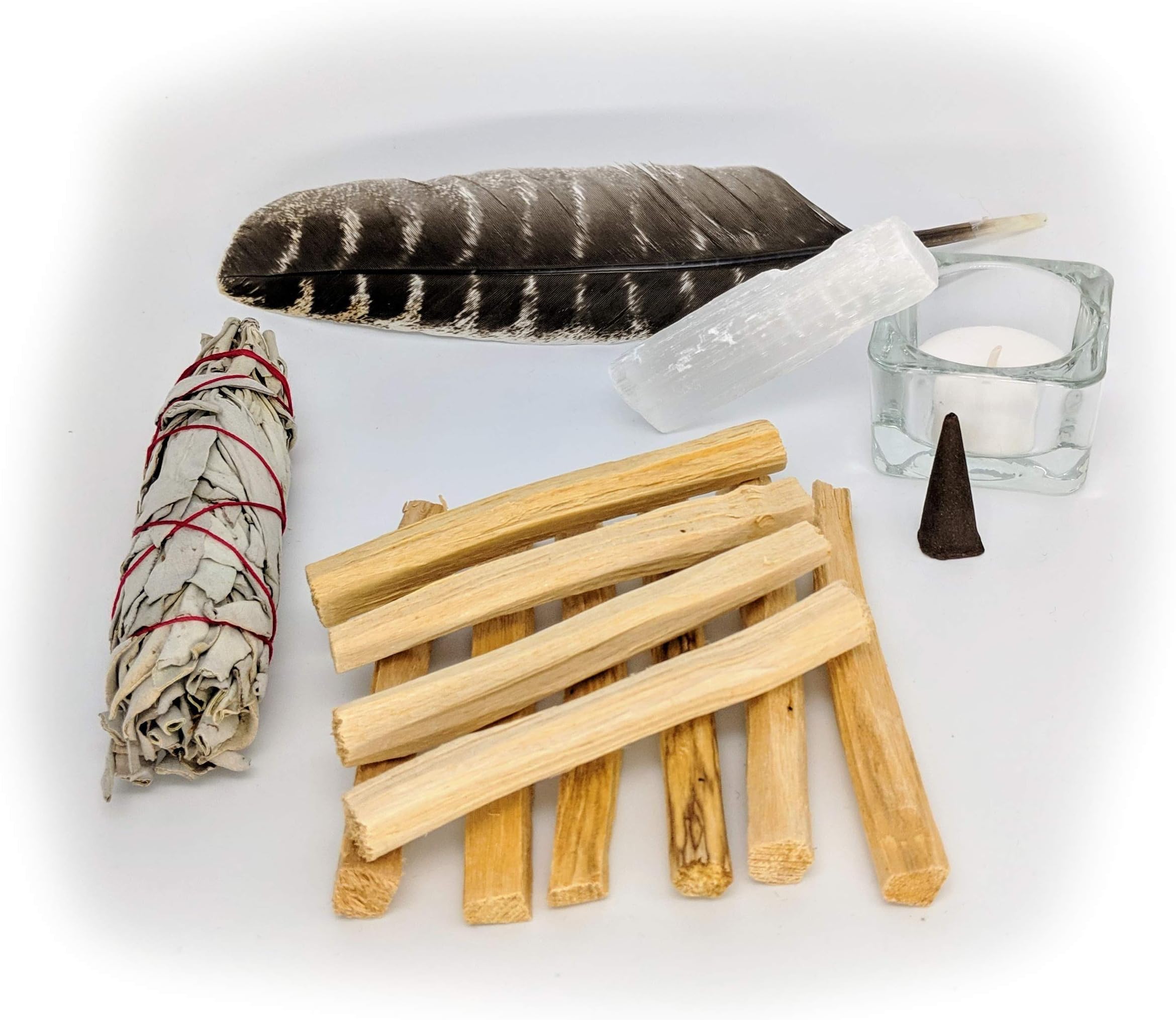 First Ritual Smudge Kit (Focus - 9 Palo Santo Sticks, 1 California White Sage Wand, 1 Ritual Feather, 1 Selenite Crystal)