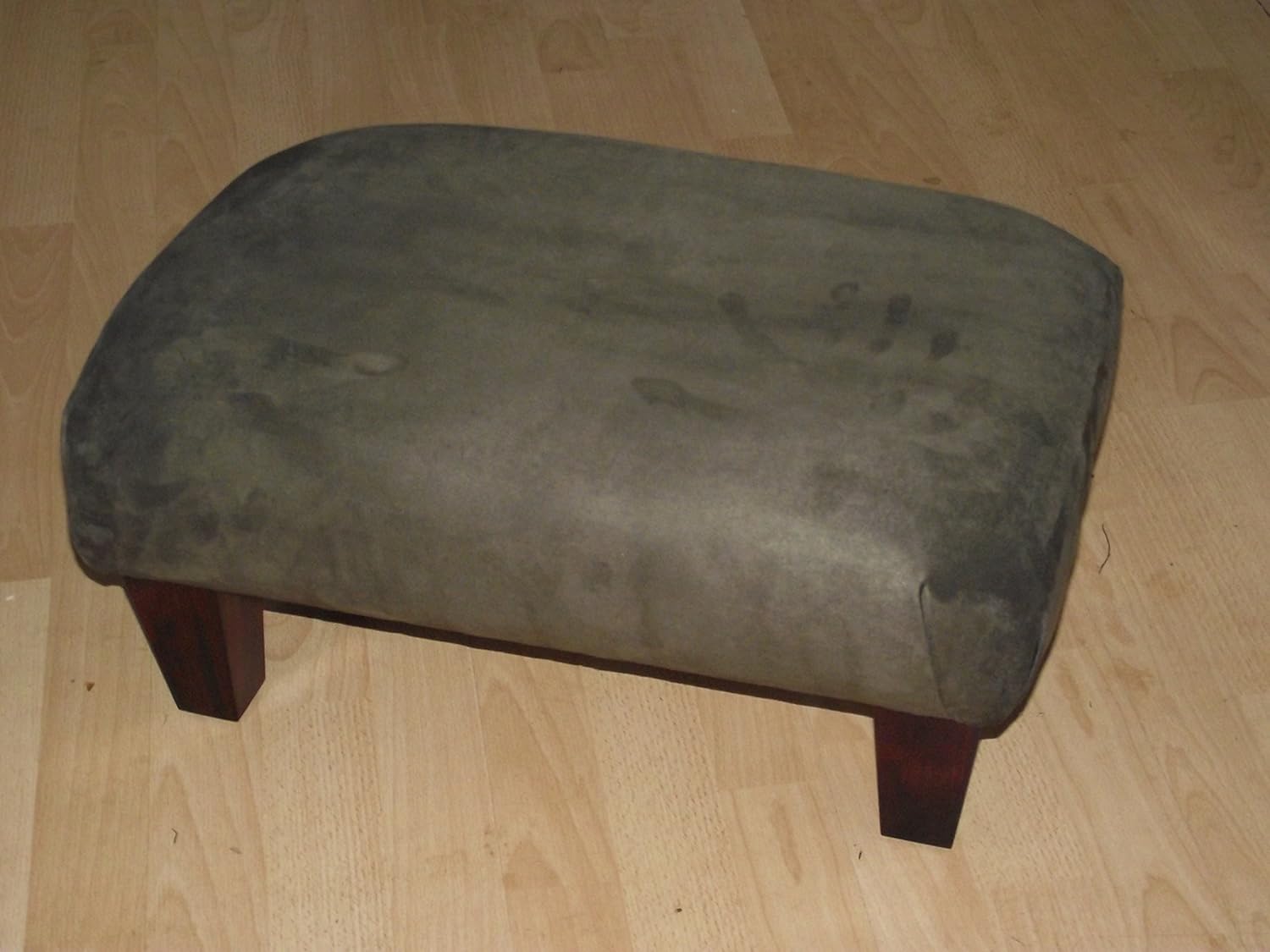 Luxury footstool in dark brown faux suede. Dark hard wood legs and