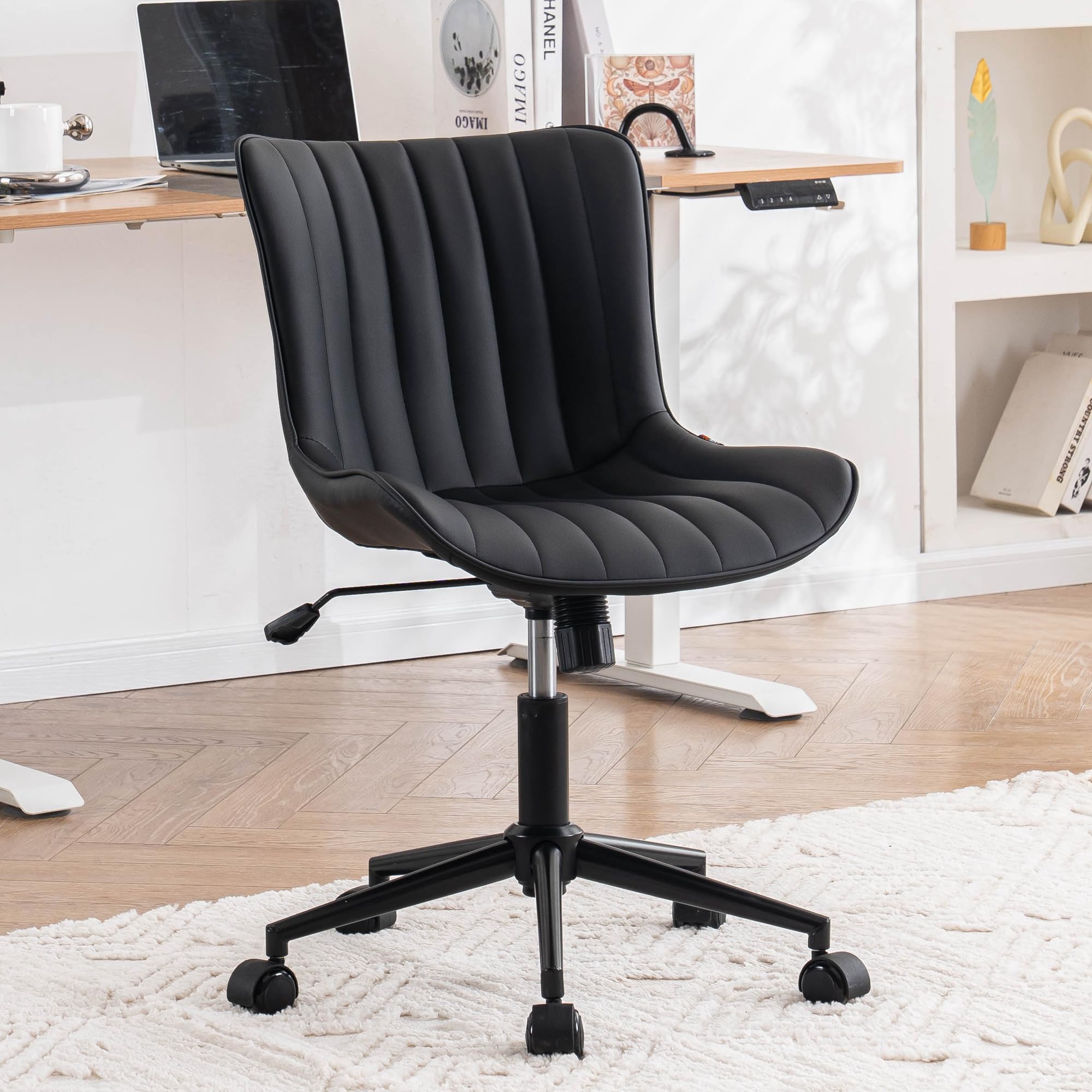 Photo 1 of YOUNIKE Black Compact Home Office Desk Chair with Wheels Comfy Armless Cute Vanity Chair with Adjustable Rocking Back Modern Leather Upholstered Rolling Swivel Small Task Drafting Sewing Chair
