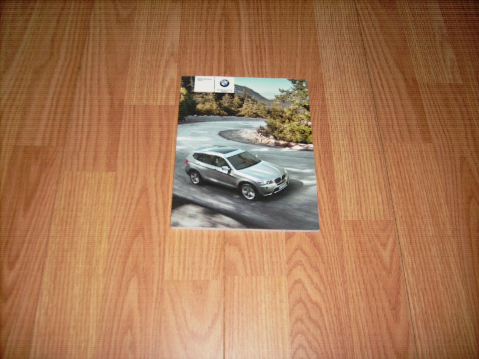 2011 BMW X3 xDrive28i xDrive35i Owners Manual Paperback – 2011