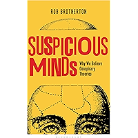 Suspicious Minds: Why We Believe Conspiracy Theories book cover