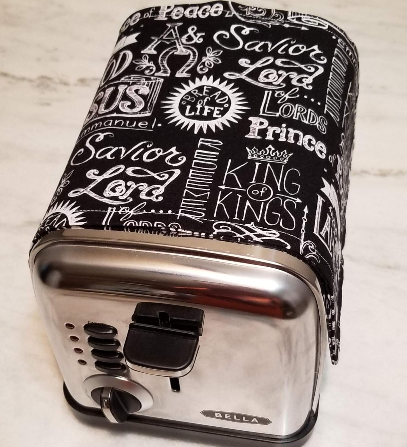 2 Slice Toaster Cover by Toaster Huggee® will help keep