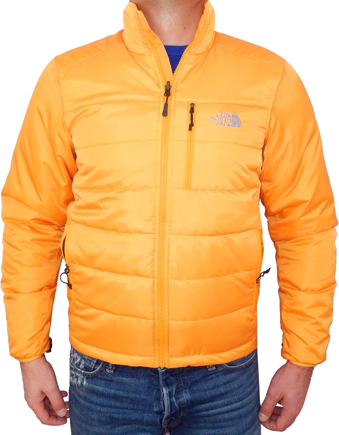 orange and black north face puffer