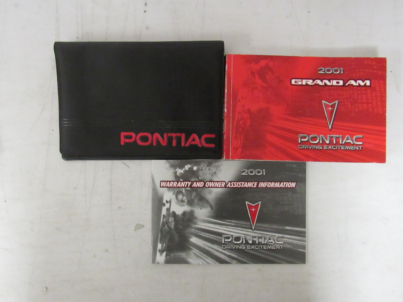 2001 Pontiac Grand AM Owners Manual Guide Book, Set With Case Paperback –  2001