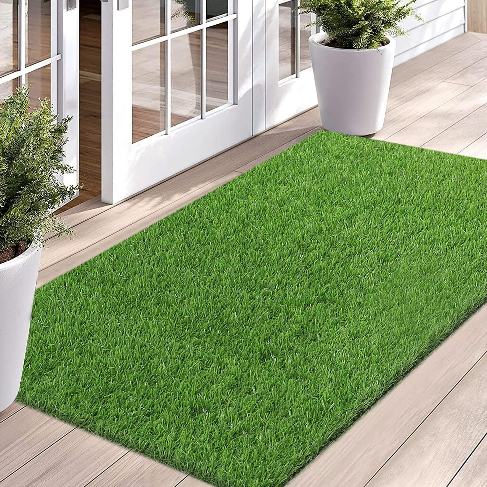 Photo 1 of Bsmathom Artificial Grass Rug Indoor Outdoor Rug, Dog Grass Mat with Drainage Holes, Synthetic Artificial Grass Turf Fake Grass Rug Door Mats for Balcony Patio Lawn Garden(51.2 x 31.5Inch)